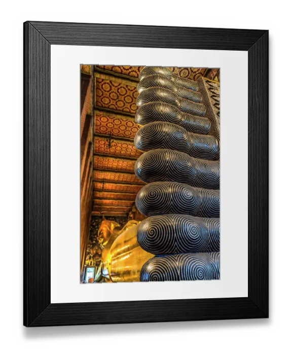Framed Print : Colorful Reclining Buddha toes, Bangkok, Thailand. Temple built in 1600's. Reclining Buddha built in 1832. Symbolize Buddha's entrance into nirvana Framed Print : Colorful Reclining Buddha toes, Bangkok, Thailand. Temple built in 1600's. Reclining Buddha built in 1832. Symbolize Buddha's entrance into nirvana