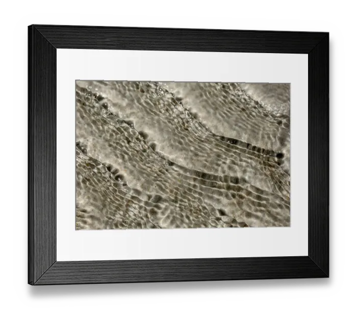 Framed Print : Ocean ripples on the sand