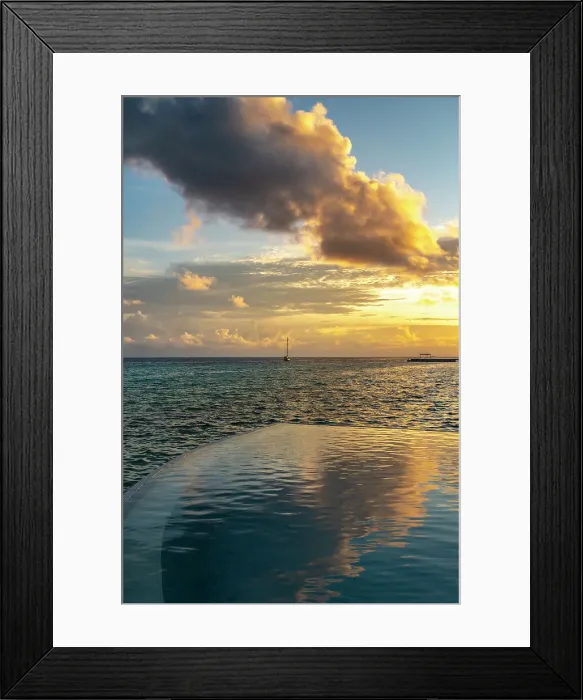 Framed Print : French Polynesia, Rangiroa Atoll. Infinity pool and sailboat at sunset. ©Cathy & Gordon Illg / Jaynes Gallery / DanitaDelimont.com Framed Print : French Polynesia, Rangiroa Atoll. Infinity pool and sailboat at sunset. ©Cathy & Gordon Illg / Jaynes Gallery / DanitaDelimont.com