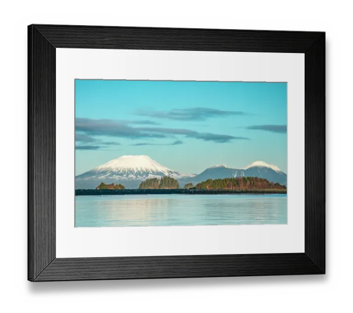 Framed Print : USA, Alaska, Sitka. Snow-covered Mt. Edgecumbe volcano and rock barrier on shore. ©Cathy & Gordon Illg  /  Jaynes Gallery  /  DanitaDelimont.com