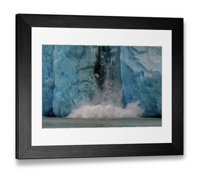 Framed Print : Tons of ice crash into the sea during a fall of ice from the terminus of Dawes Glacier Framed Print : Tons of ice crash into the sea during a fall of ice from the terminus of Dawes Glacier