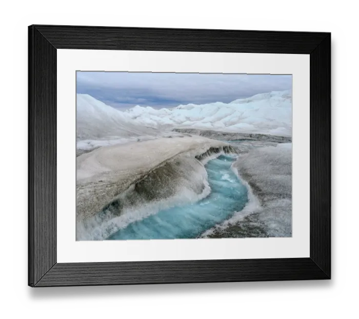 Framed Print : Drainage system on the surface of the ice sheet. The brown sediment on the ice is created by the rapid melting of the ice. Landscape of Greenland near Kangerlussuaq, Kingdom of Denmark
