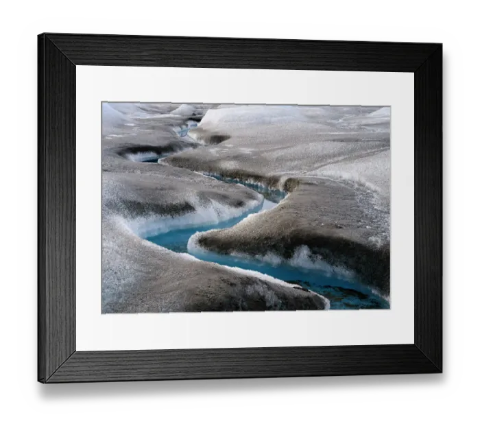 Framed Print : Drainage system on the surface of the ice sheet. The brown sediment on the ice is created by the rapid melting of the ice. Landscape of Greenland near Kangerlussuaq, Kingdom of Denmark Framed Print : Drainage system on the surface of the ice sheet. The brown sediment on the ice is created by the rapid melting of the ice. Landscape of Greenland near Kangerlussuaq, Kingdom of Denmark