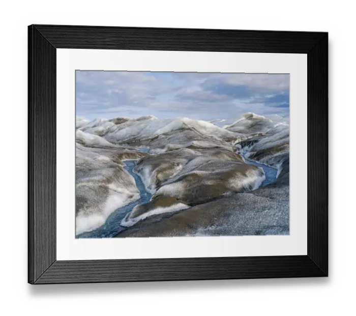 Framed Print : Drainage system on the surface of the ice sheet. The brown sediment on the ice is created by the rapid melting of the ice. Landscape of Greenland near Kangerlussuaq, Kingdom of Denmark Framed Print : Drainage system on the surface of the ice sheet. The brown sediment on the ice is created by the rapid melting of the ice. Landscape of Greenland near Kangerlussuaq, Kingdom of Denmark