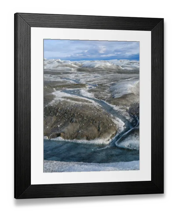 Framed Print : Drainage system on the surface of the ice sheet. The brown sediment on the ice is created by the rapid melting of the ice. Landscape of Greenland near Kangerlussuaq, Kingdom of Denmark Framed Print : Drainage system on the surface of the ice sheet. The brown sediment on the ice is created by the rapid melting of the ice. Landscape of Greenland near Kangerlussuaq, Kingdom of Denmark