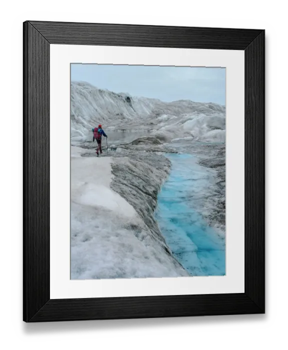 Framed Print : Tourists hiking on the ice. The brown sediment on the ice is created by the rapid melting of the ice. Landscape of Greenland near Kangerlussuaq, Kingdom of Denmark