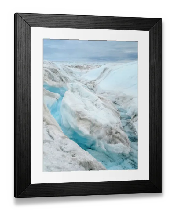 Framed Print : Drainage system on the surface of the ice sheet. The brown sediment on the ice is created by the rapid melting of the ice. Landscape of Greenland near Kangerlussuaq, Kingdom of Denmark Framed Print : Drainage system on the surface of the ice sheet. The brown sediment on the ice is created by the rapid melting of the ice. Landscape of Greenland near Kangerlussuaq, Kingdom of Denmark