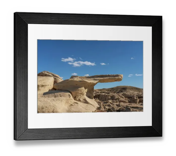 Framed Print : USA, New Mexico, Bisti / De-Na-Zin Wilderness. Mudstone protruding formation in badlands