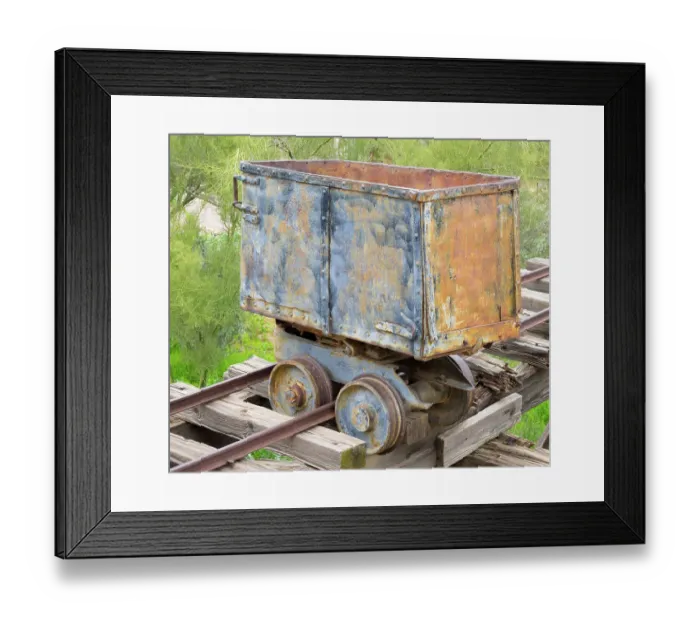 Framed Print : Arizona. Old gold mining ore carrier, detail showing the wheels and rail tracks