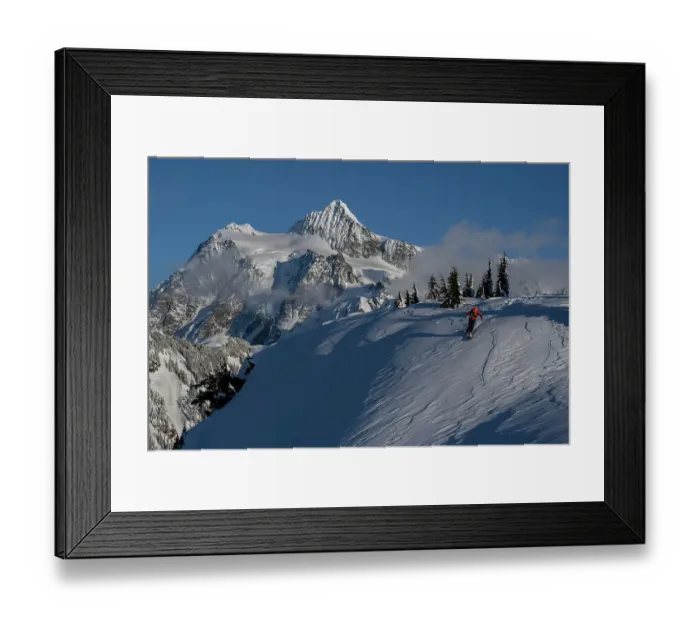 Framed Print : USA, Washington State. Skier challenged by wind-drifted snow with Mount Shuksan in background. (MR)