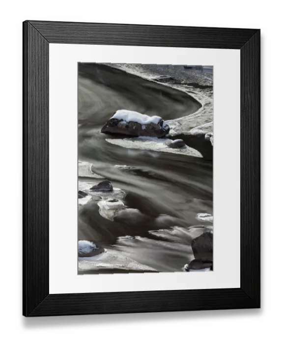 Framed Print : USA, Wyoming, Yellowstone National Park. A long time exposure creates blurred lines of water flowing around rock and ice in a partially frozen Lamar River Framed Print : USA, Wyoming, Yellowstone National Park. A long time exposure creates blurred lines of water flowing around rock and ice in a partially frozen Lamar River
