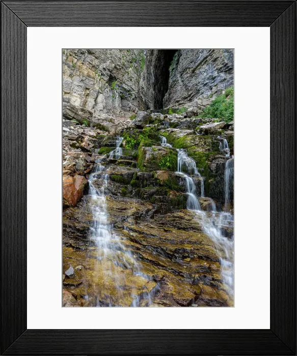 Framed Print : USA, Wyoming. Waterfall coming out of Wind Cave, Teton Mountains