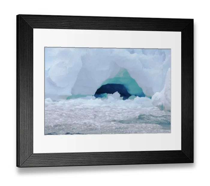 Framed Print : Southern Ocean, Antarctica. Beautiful blue and purple colors in the ice are exposed by the erosion of the tabular berg