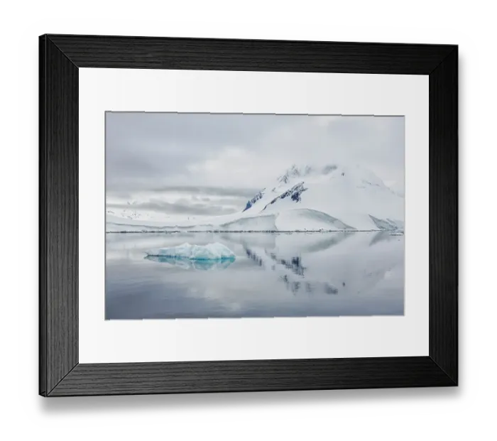 Framed Print : Southern Ocean, Antarctica, Paradise Bay. Calm waters yield reflections of the snow covered mountains Framed Print : Southern Ocean, Antarctica, Paradise Bay. Calm waters yield reflections of the snow covered mountains