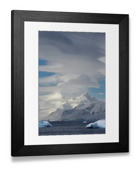 Framed Print : Southern Ocean, Antarctica, Northwest Peninsula. View of the mountains and the lenticular clouds Framed Print : Southern Ocean, Antarctica, Northwest Peninsula. View of the mountains and the lenticular clouds