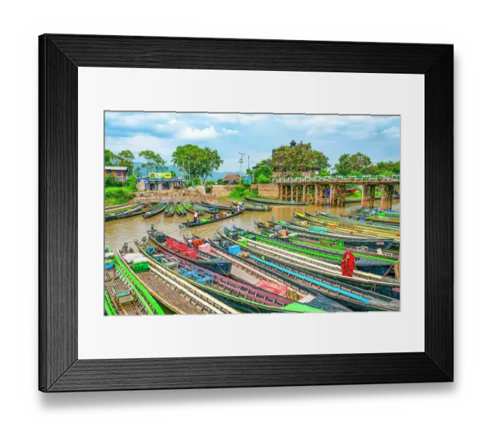 Framed Print : Nyaungshwe, Myanmar, Asia, Wide angle portrait of Buddhist monk in red robe making his way onto long boat in canal Framed Print : Nyaungshwe, Myanmar, Asia, Wide angle portrait of Buddhist monk in red robe making his way onto long boat in canal