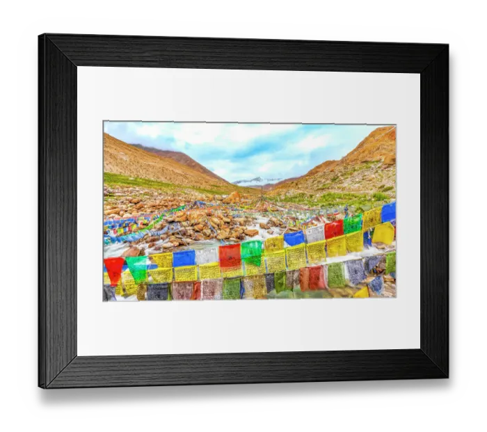 Framed Print : Ladakh, India. Wide angle landscape view of mountain river rushing under prayer flags down a valley from the Himalayan Mountains Framed Print : Ladakh, India. Wide angle landscape view of mountain river rushing under prayer flags down a valley from the Himalayan Mountains