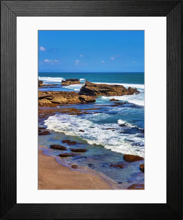 Framed Print : Sunset at rocky shoreline of Love Beach