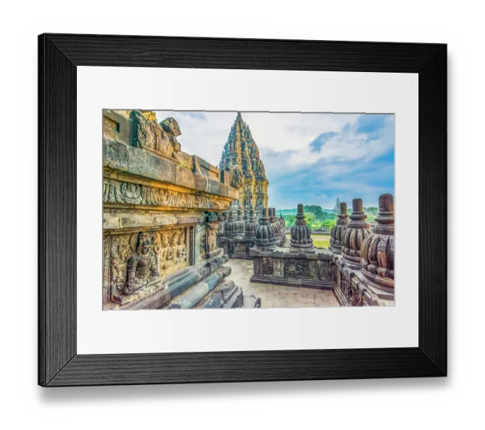 Framed Print : Java, Indonesia. Close-up wide angle view of temple section in Candi Prambanan Temple Complex, a UNESCO Site called the twin to Angkor Wat Framed Print : Java, Indonesia. Close-up wide angle view of temple section in Candi Prambanan Temple Complex, a UNESCO Site called the twin to Angkor Wat