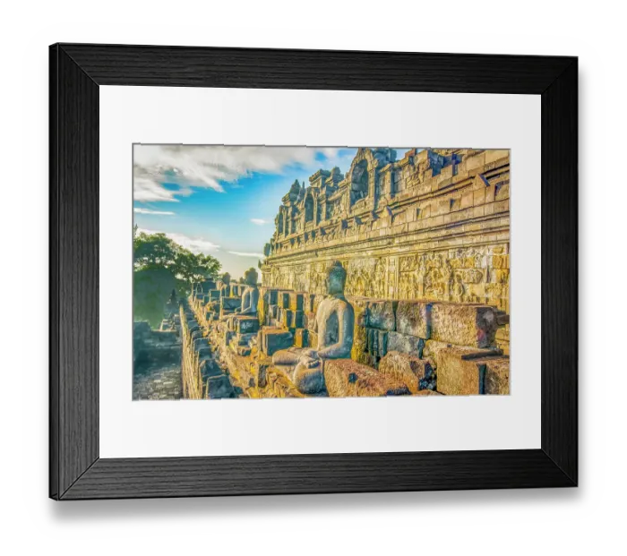 Framed Print : Java, Indonesia. Close-up detail of some of the original 504 statues of Buddha on a ledge of Borobudur Temple
