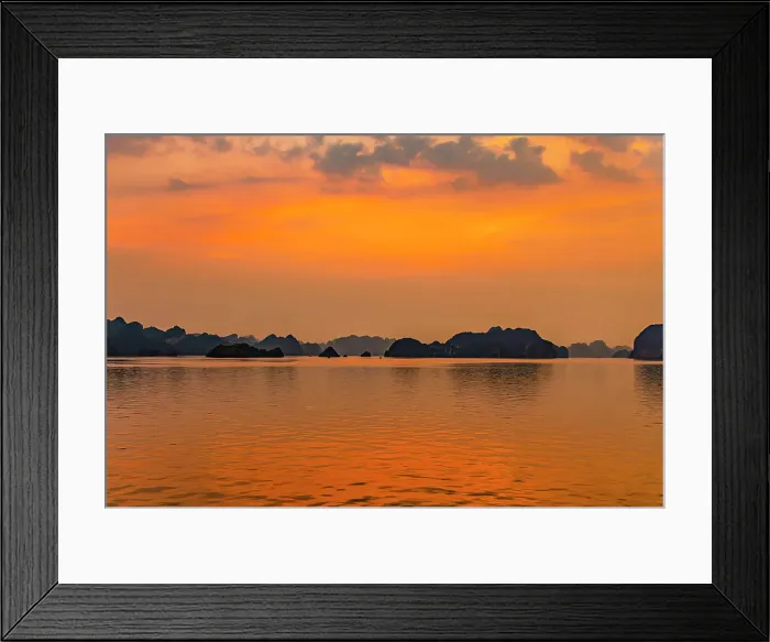 Framed Print : Ha Long Bay, Vietnam. Wide angle landscape view of fishing boats at sunset among the limestone karsts and islets of the UNESCO Heritage Site