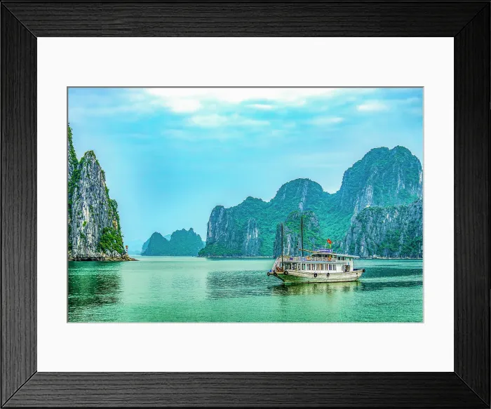 Framed Print : Ha Long Bay, Vietnam. Wide angle landscape view of tourist boat among the limestone karsts and islets of the UNESCO Heritage Site