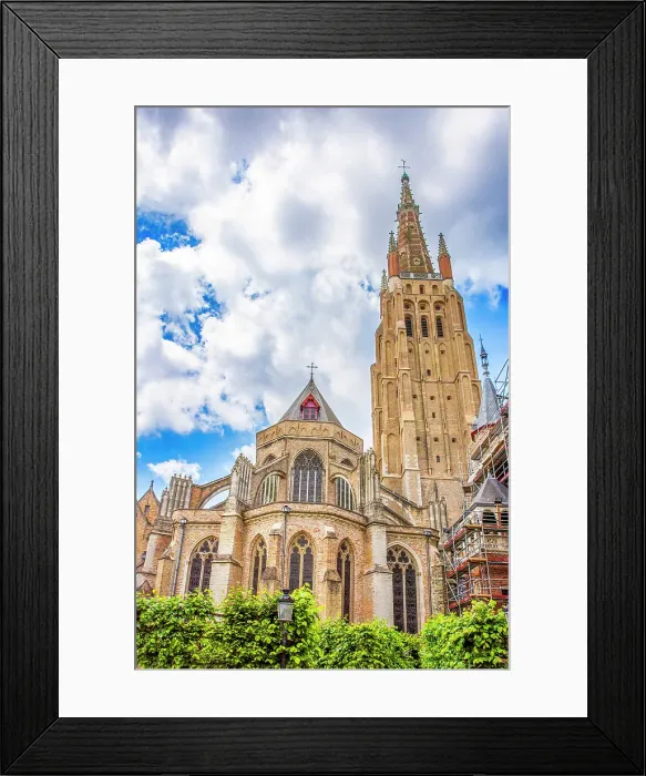 Framed Print : Church of Our Lady, Bruges, Belgium. Wide angle portrait of 13th Century church in city known for its canals, cobbled streets and medieval buildings Framed Print : Church of Our Lady, Bruges, Belgium. Wide angle portrait of 13th Century church in city known for its canals, cobbled streets and medieval buildings