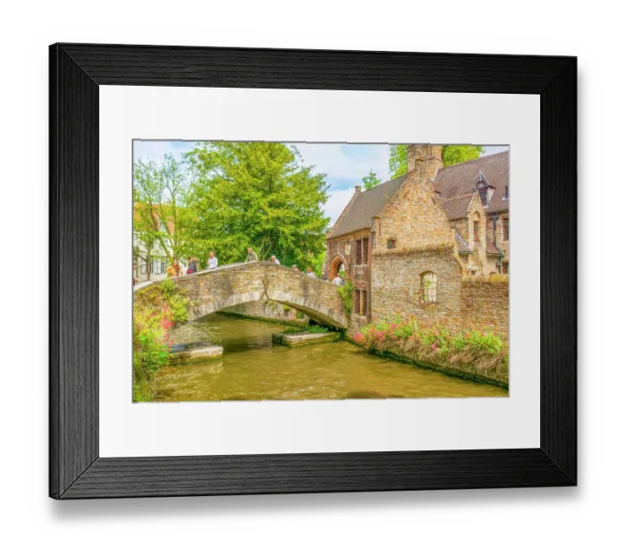 Framed Print : Bruges, Belgium. Landscape view of canal and medieval buildings which make it a famous UNESCO tourist attraction. (Editorial Use Only) Framed Print : Bruges, Belgium. Landscape view of canal and medieval buildings which make it a famous UNESCO tourist attraction. (Editorial Use Only)