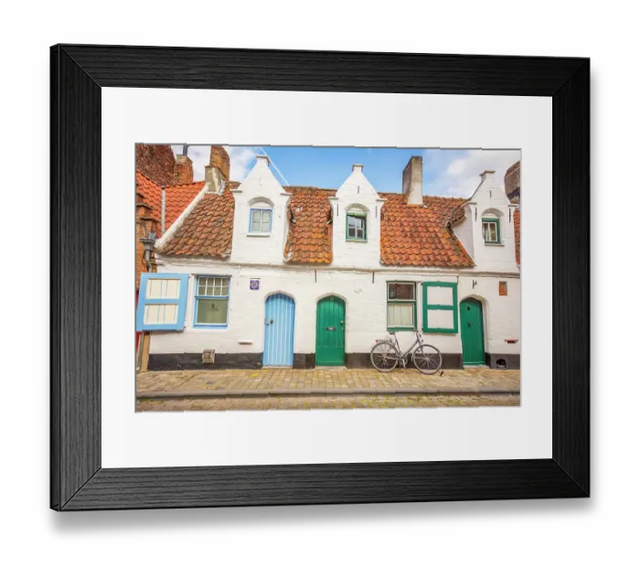 Framed Print : Bruges, Belgium. Wide angle view of cobbled streets and medieval buildings which make it a famous UNESCO tourist attraction. (Editorial Use Only) Framed Print : Bruges, Belgium. Wide angle view of cobbled streets and medieval buildings which make it a famous UNESCO tourist attraction. (Editorial Use Only)