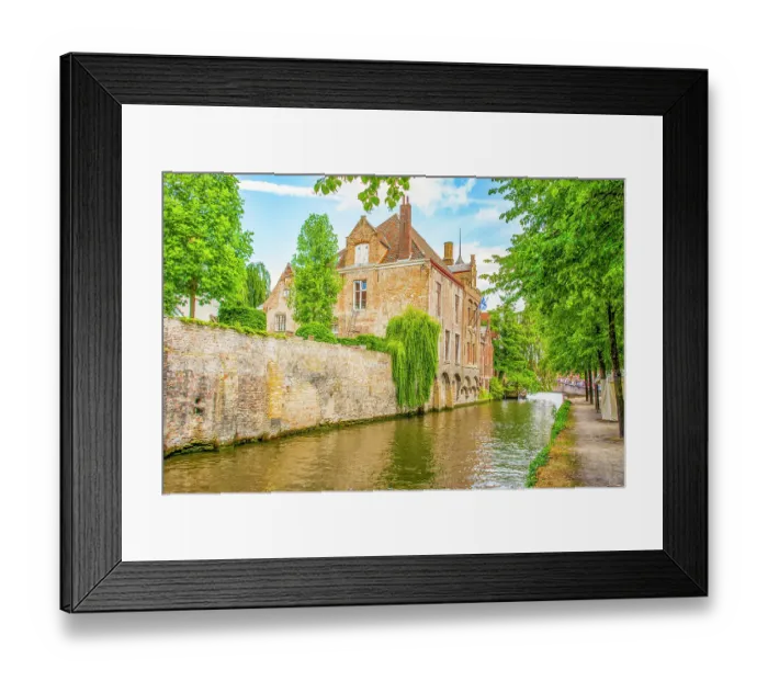 Framed Print : Bruges, Belgium. Landscape view of city known for its canals, cobbled streets and medieval buildings Framed Print : Bruges, Belgium. Landscape view of city known for its canals, cobbled streets and medieval buildings