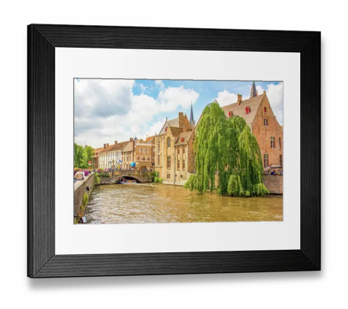 Framed Print : Bruges, Belgium. Wide angle landscape view of city known for its canals, cobbled streets and medieval buildings Framed Print : Bruges, Belgium. Wide angle landscape view of city known for its canals, cobbled streets and medieval buildings