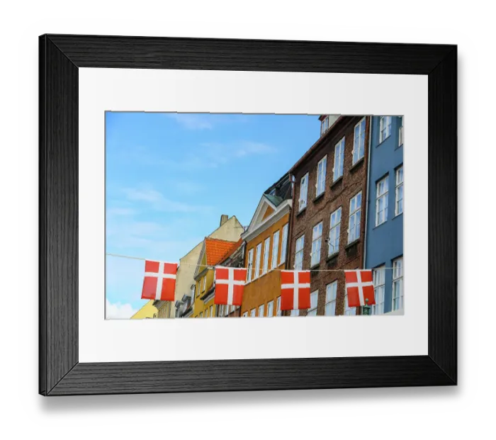 Framed Print : Copenhagen, Denmark. Nyhavn area, colorful painted houses, Denmark flag