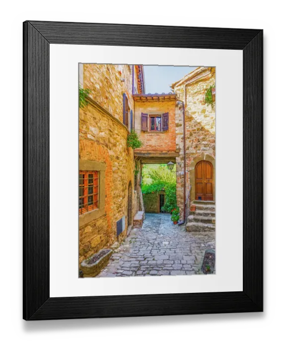 Framed Print : Greve in Chianti, Tuscany, Italy. Vertical street view of ancient buildings showing shuttered windows and stonework walls Framed Print : Greve in Chianti, Tuscany, Italy. Vertical street view of ancient buildings showing shuttered windows and stonework walls