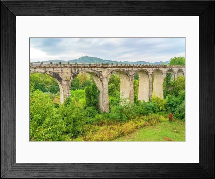Framed Print : Roman Aqueduct, Brisighella, Italy. Wide angle landscape view of ancient Roman aqueduct outside town Framed Print : Roman Aqueduct, Brisighella, Italy. Wide angle landscape view of ancient Roman aqueduct outside town