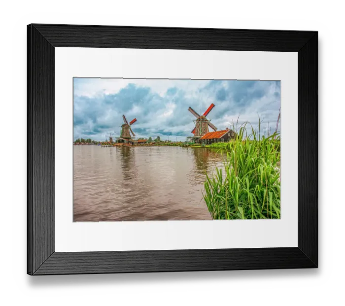 Framed Print : Zaanse Schans, Netherlands. Wide angle view of iconic Dutch tourist village which features six functioning windmills Framed Print : Zaanse Schans, Netherlands. Wide angle view of iconic Dutch tourist village which features six functioning windmills