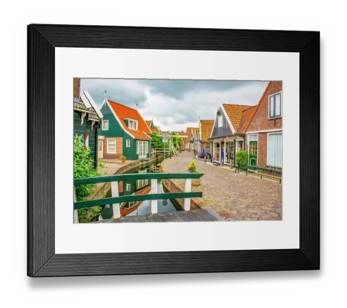 Framed Print : Volendam, Netherlands. Wide angle view of historic, traditional fishing village on the shores of the North Sea Framed Print : Volendam, Netherlands. Wide angle view of historic, traditional fishing village on the shores of the North Sea
