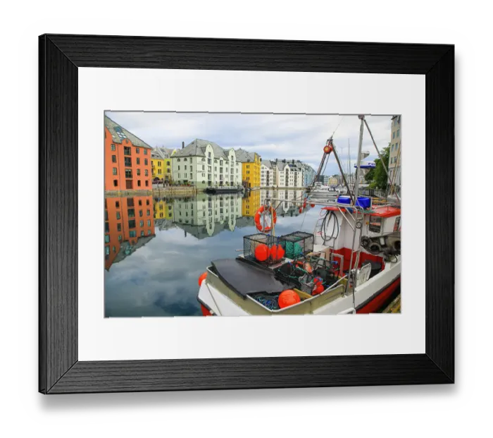Framed Print : Alesund, Norway. Fishing boat and canal water reflection