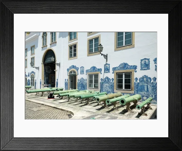 Framed Print : Lisbon, Portugal. Old canons line the courtyard in a former military headquarter