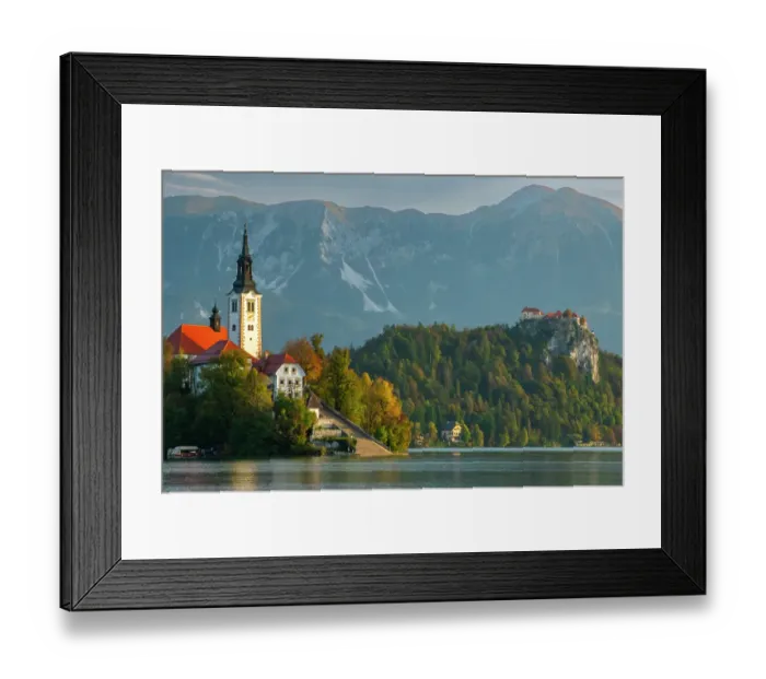 Framed Print : Slovenia, Bled, Lake Bled. Town and island church reflect in lake. ©Cathy & Gordon Illg / Jaynes Gallery / DanitaDelimont.com Framed Print : Slovenia, Bled, Lake Bled. Town and island church reflect in lake. ©Cathy & Gordon Illg / Jaynes Gallery / DanitaDelimont.com