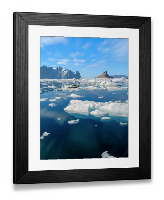 Framed Print : Landscape with icebergs near Ikerasak in the Uummannaq Fjord System in the northwest of Greenland, Danish Territory. (Editorial Use Only)