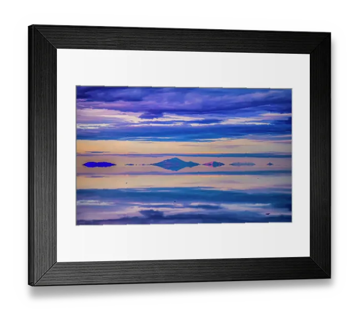 Framed Print : Salar de Uyuni, Bolivia. Wide angle landscape view at sunset of clouds over the Salar de Uyuni, the world's largest salt flat Framed Print : Salar de Uyuni, Bolivia. Wide angle landscape view at sunset of clouds over the Salar de Uyuni, the world's largest salt flat