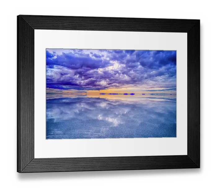 Framed Print : Salar de Uyuni, Bolivia. Wide angle landscape view at sunset of clouds over the Salar de Uyuni, the world's largest salt flat Framed Print : Salar de Uyuni, Bolivia. Wide angle landscape view at sunset of clouds over the Salar de Uyuni, the world's largest salt flat