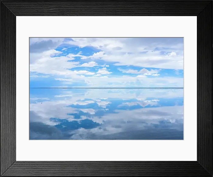 Framed Print : Salar de Uyuni, Bolivia. Wide angle landscape view of clouds reflecting over the Salar de Uyuni, the world's largest salt flat Framed Print : Salar de Uyuni, Bolivia. Wide angle landscape view of clouds reflecting over the Salar de Uyuni, the world's largest salt flat