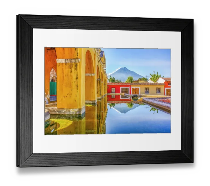 Framed Print : Antigua, Guatemala. Wide angle landscape view of 18th Century public wash basins with Volcan Agua in the background Framed Print : Antigua, Guatemala. Wide angle landscape view of 18th Century public wash basins with Volcan Agua in the background