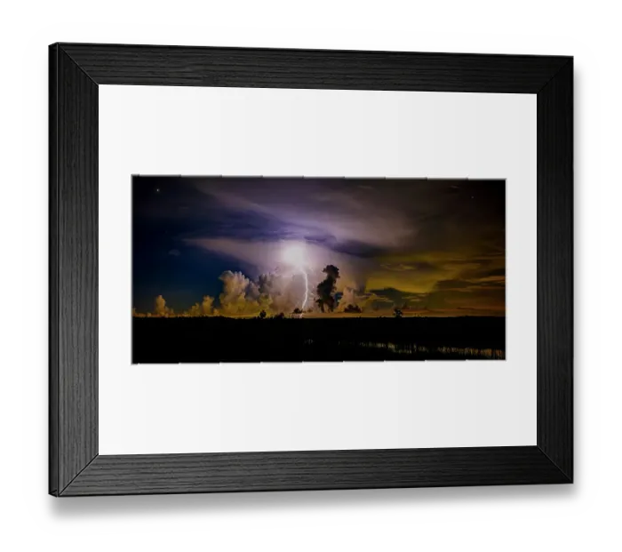 Framed Print : A distant thunder storm and sky draws contrast to the dark Big Cypress prairie