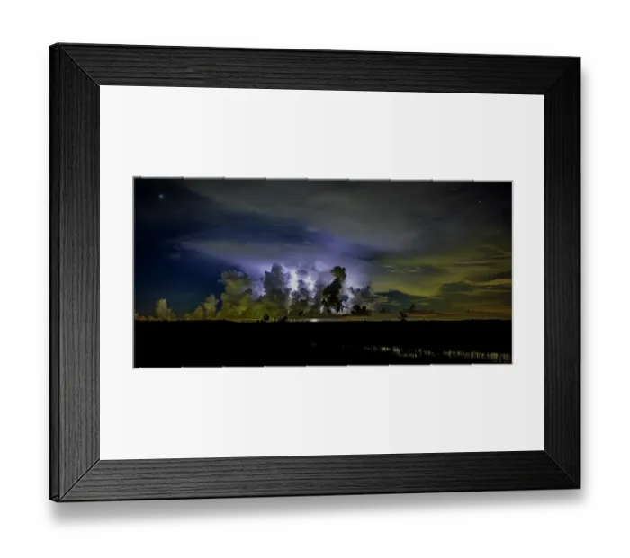 Framed Print : A distant thunder storm and sky draws contrast to the dark Big Cypress prairie Framed Print : A distant thunder storm and sky draws contrast to the dark Big Cypress prairie