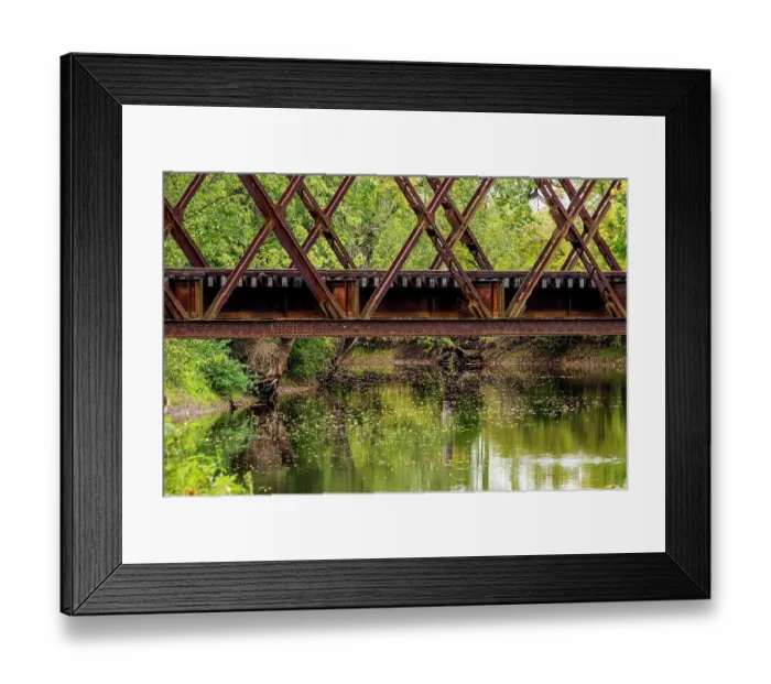 Framed Print : USA, Vermont. Rusted train bridge with tracks over Otter Creek