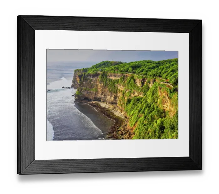 Framed Print : Uluwatu Temple is one of Bali's most important spiritual sites and is dedicated to the spirits of the sea. It is believed to protect the island from evil sea spirits