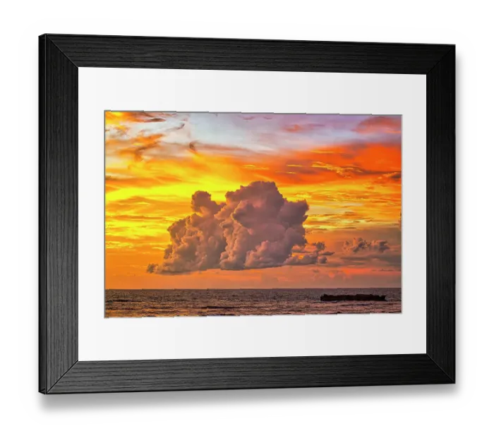 Framed Print : Bali's sunsets are often considered postcard-perfect, with their stunning colors and breathtaking scenery. Here is a Black and White at sunset high tide Framed Print : Bali's sunsets are often considered postcard-perfect, with their stunning colors and breathtaking scenery. Here is a Black and White at sunset high tide