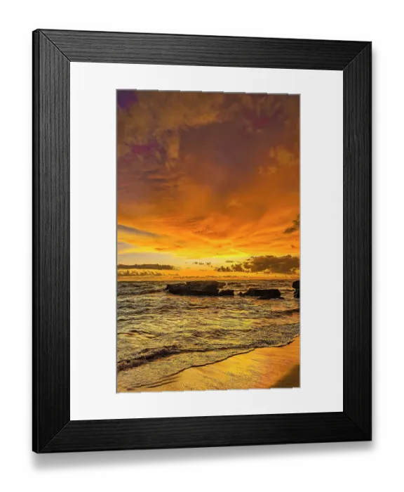 Framed Print : Bali's sunsets are often considered postcard-perfect, with their stunning colors and breathtaking scenery. Here is a Black and White at sunset high tide